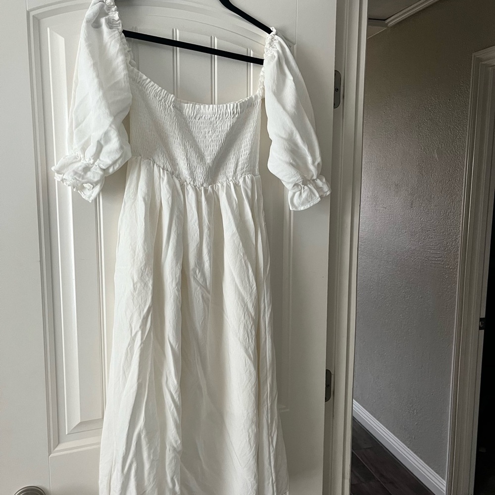White off the shoulder Vici dress.